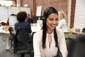 female customer service agent working at desk